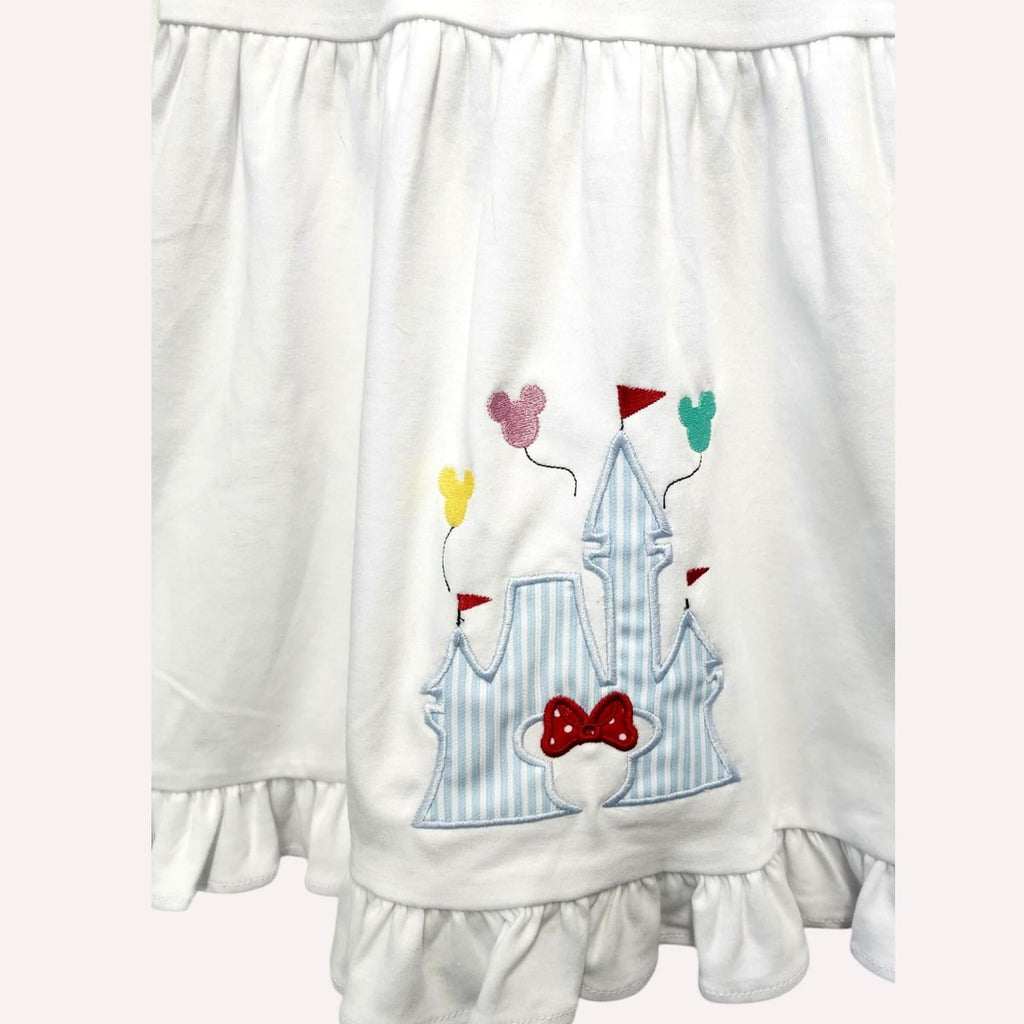 White baby diaper with colorful castle design on a white background