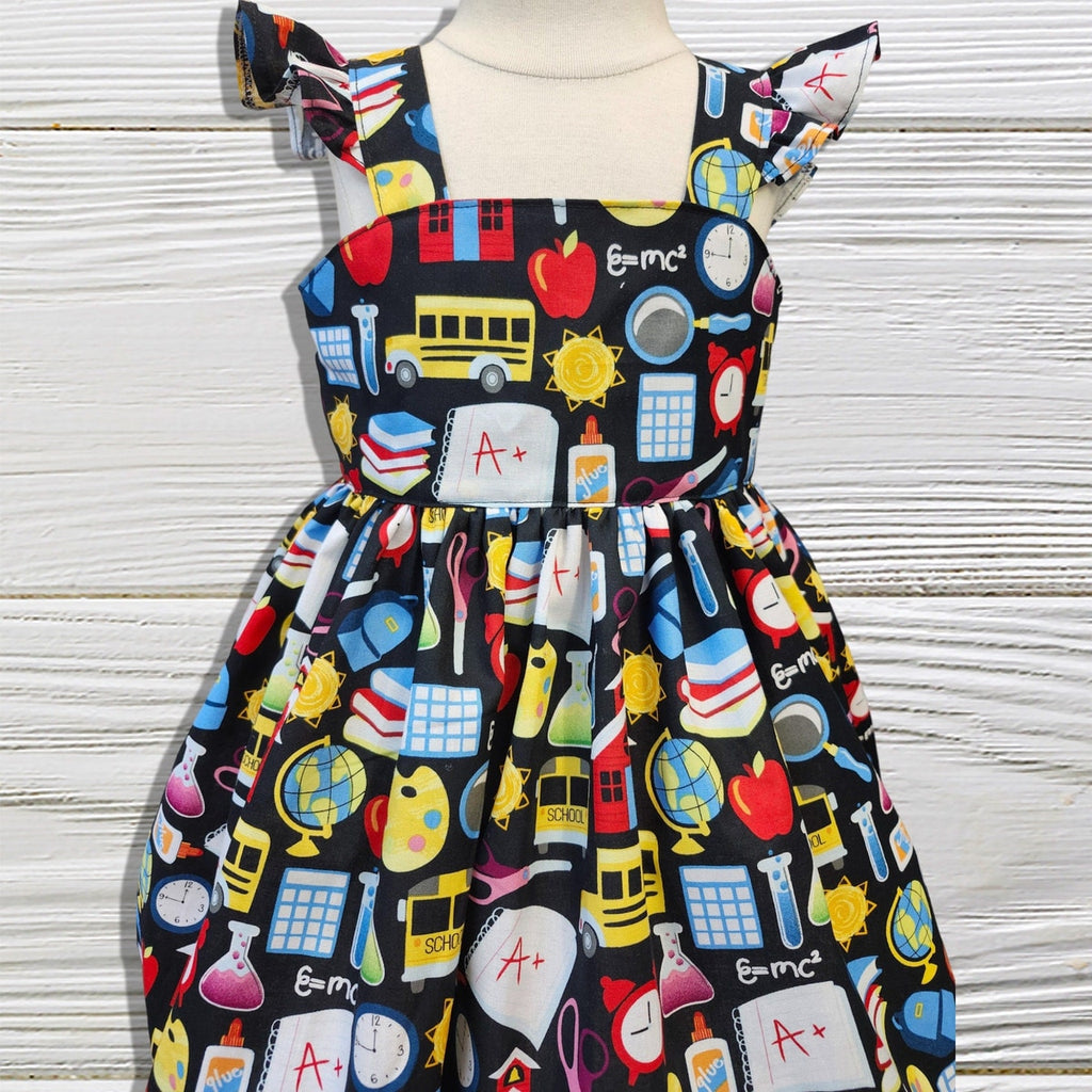 Children's dress with educational pattern on a white background