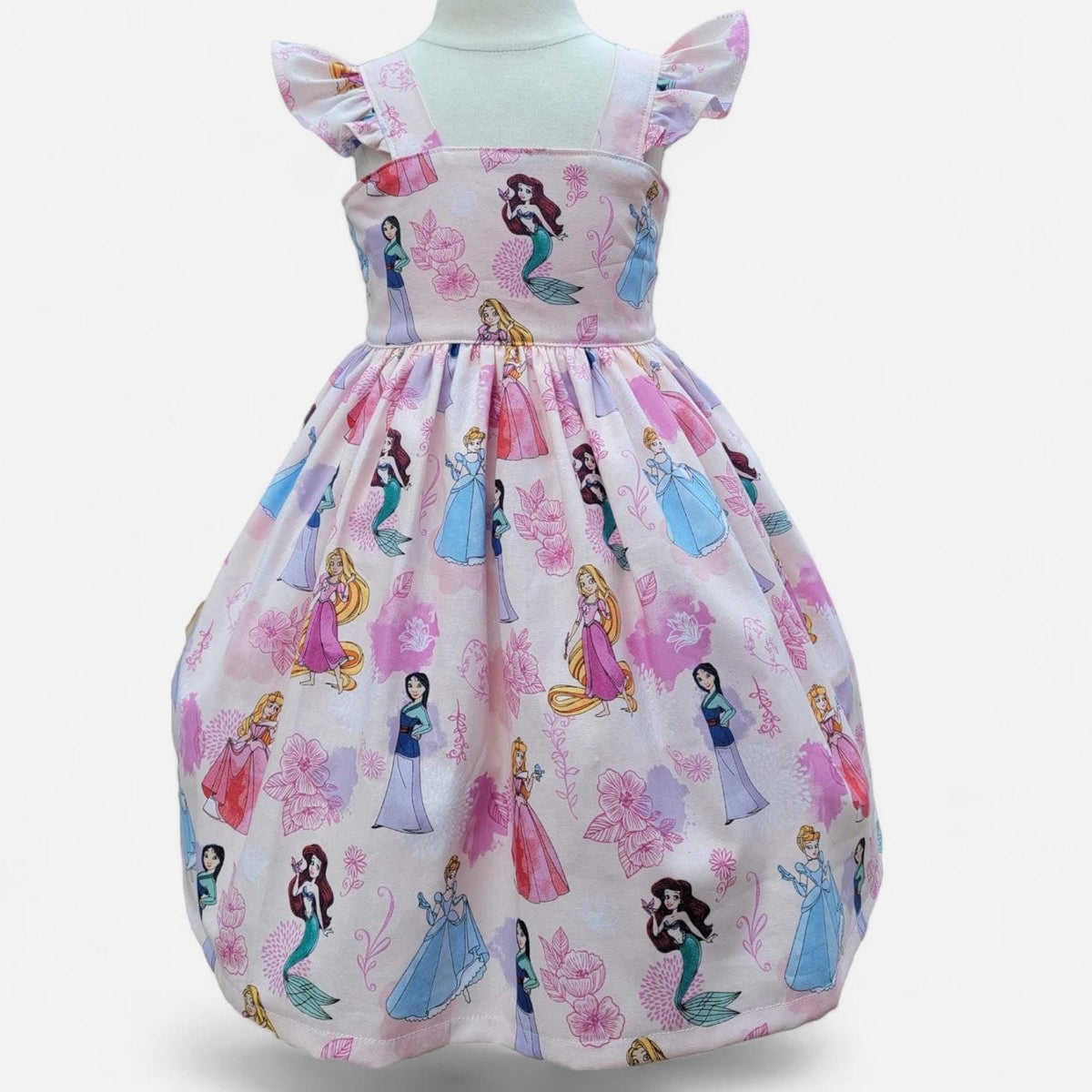 Children's dress with princess pattern on a white background