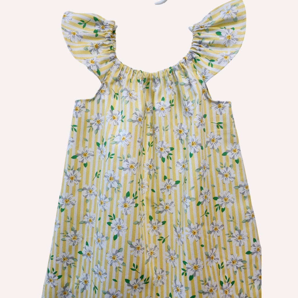 Yellow floral dress with ruffled sleeves on a white background