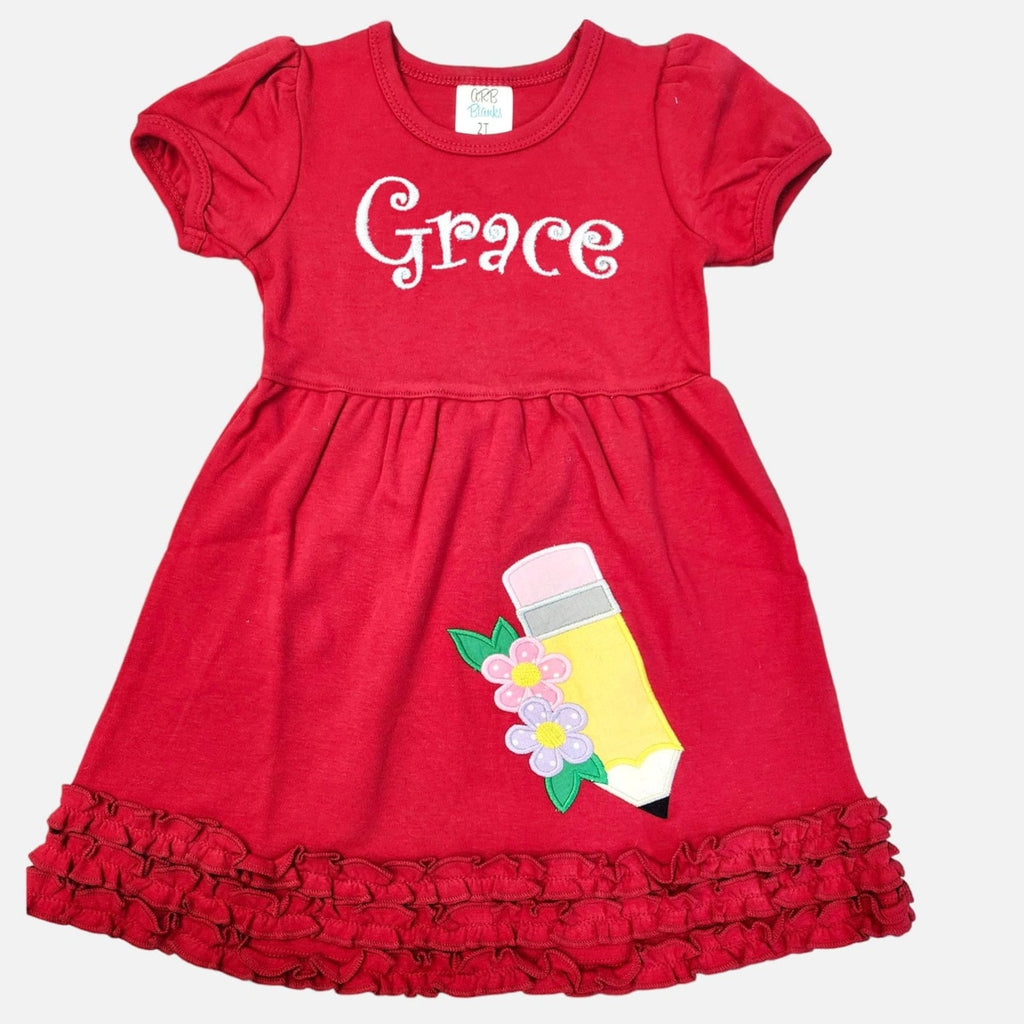 Red dress with 'Grace' printed on it and a pencil design on a white background