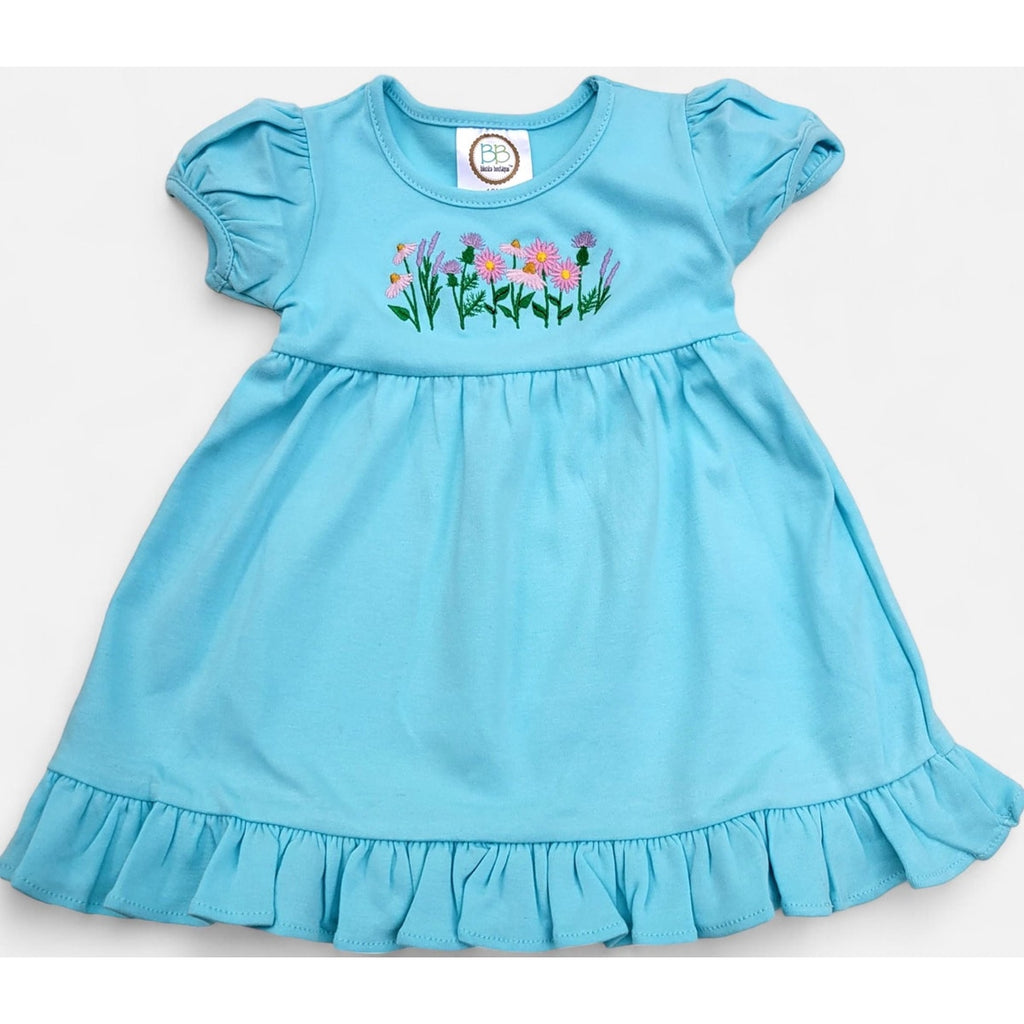 Light blue dress with floral embroidery on a white background