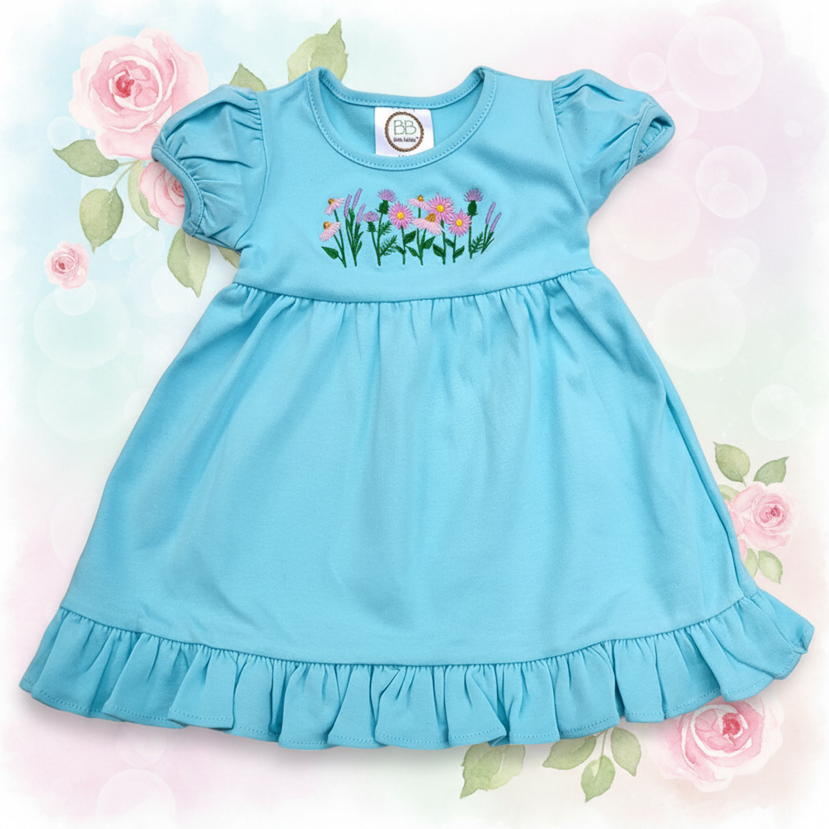 Blue dress with floral embroidery on a floral background