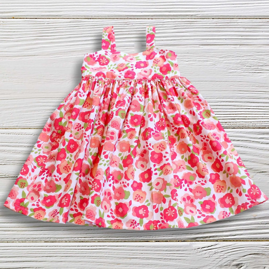 Floral dress on a wooden surface