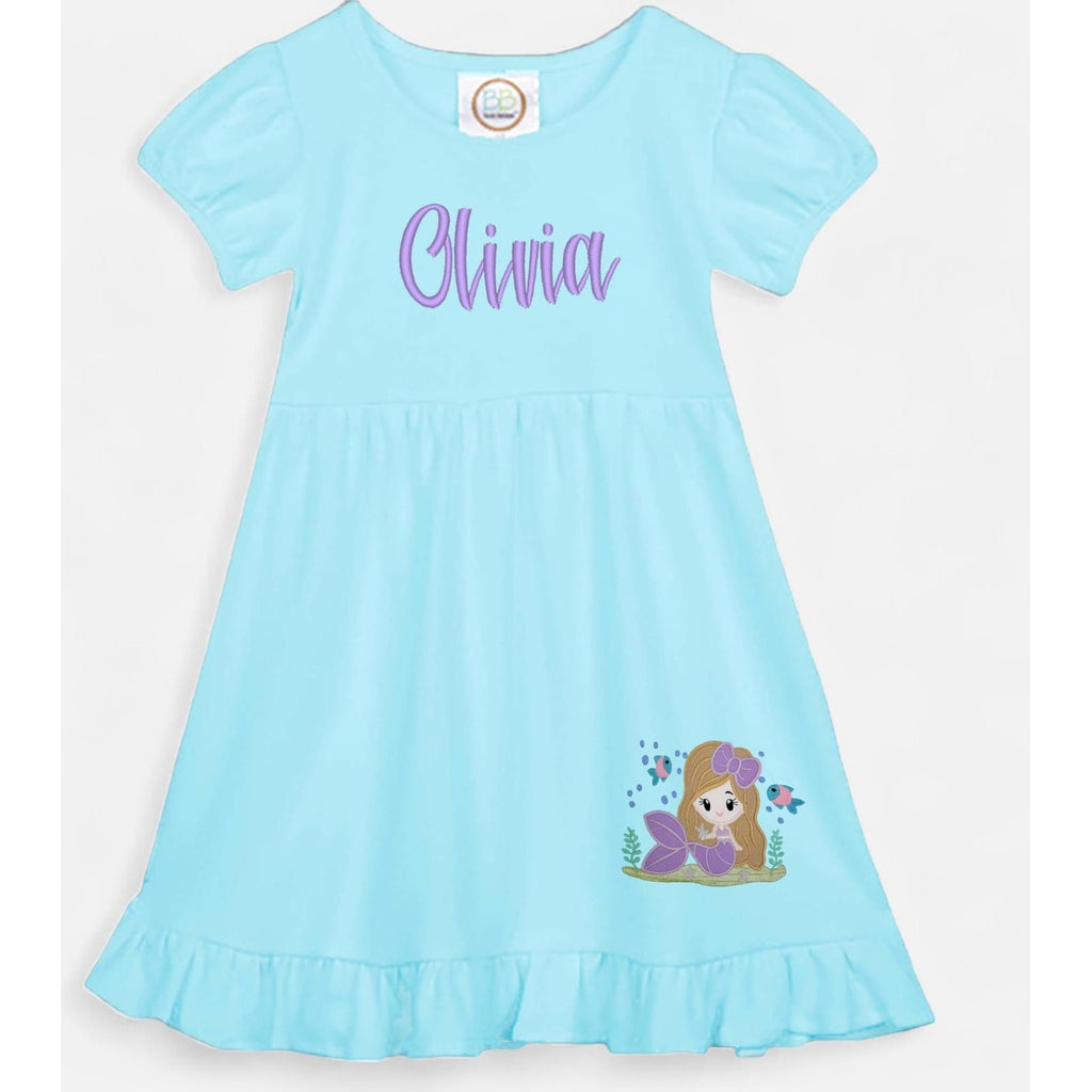 Light blue nightgown with 'Olivia' printed on it and a mermaid design on a white background