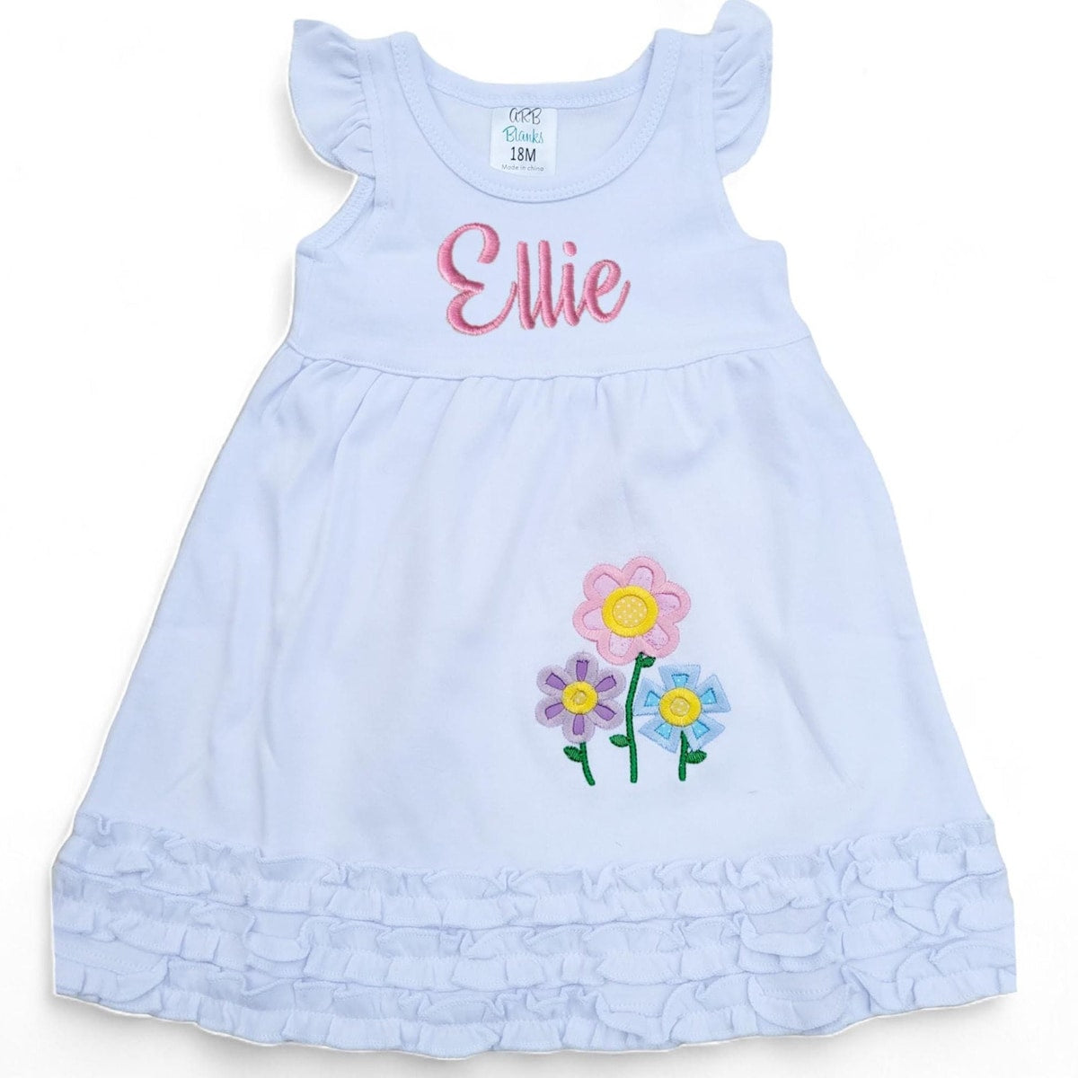 Light blue dress with embroidered flowers and name 'Ellie' on a white background