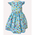 Children's dress with Easter pattern on a mannequin against a white background