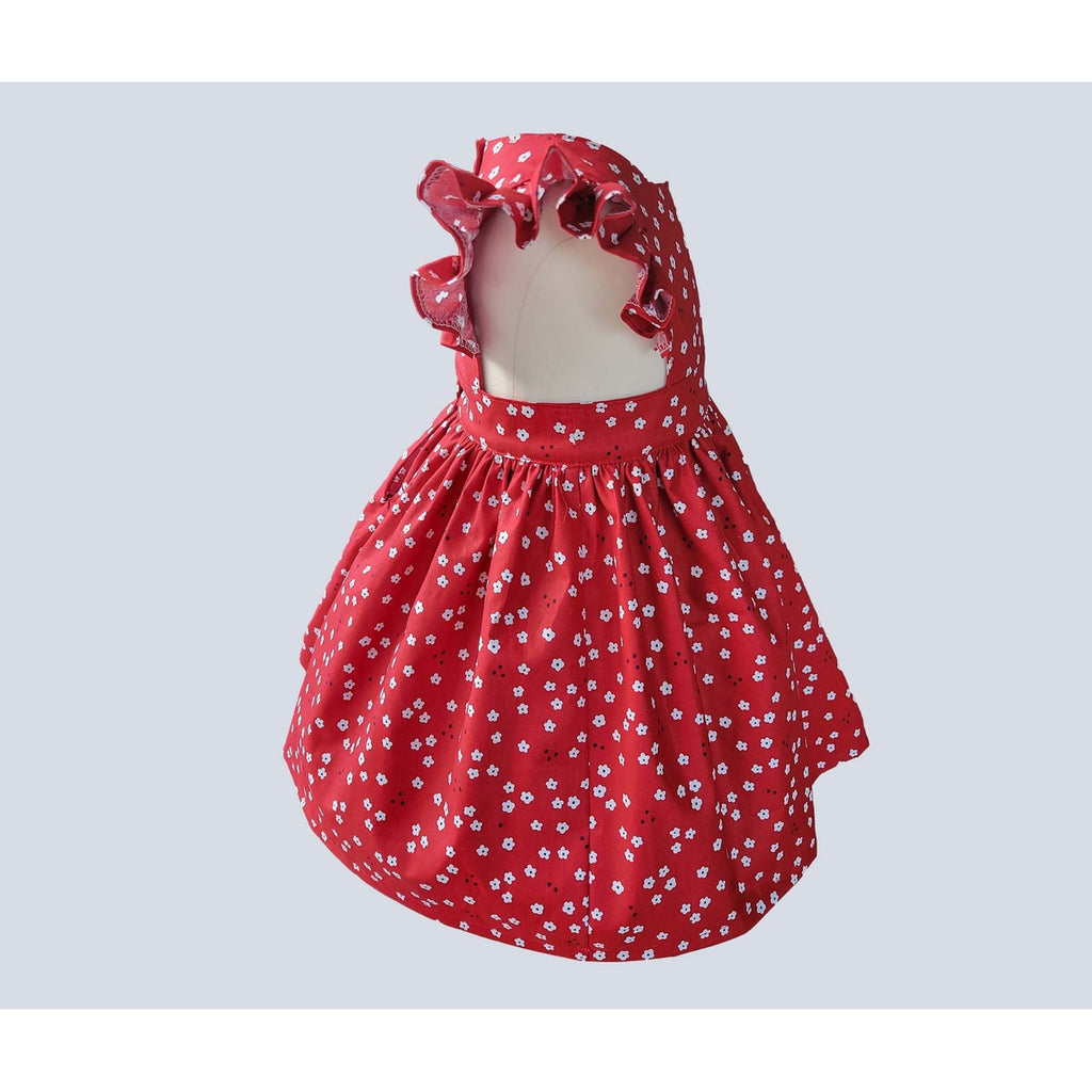 Red floral dress with a bow on a light gray background