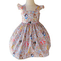Dress with princesses in a floral pattern on a white background