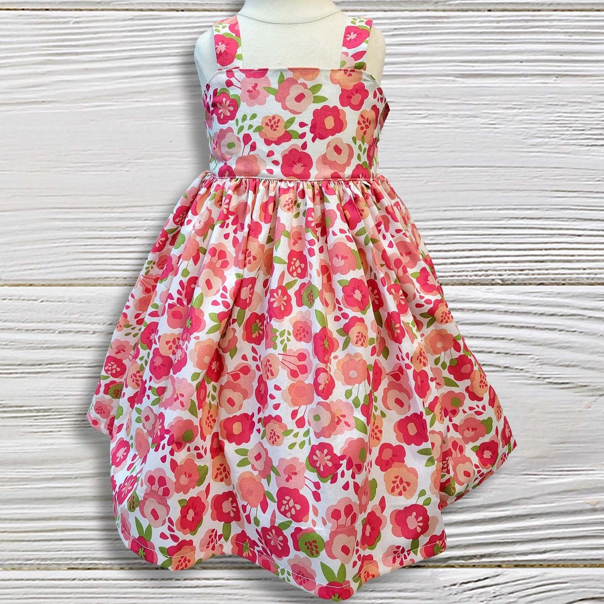Floral dress on a wooden surface