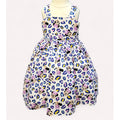 Dress with Minnie Mouse pattern on a white background
