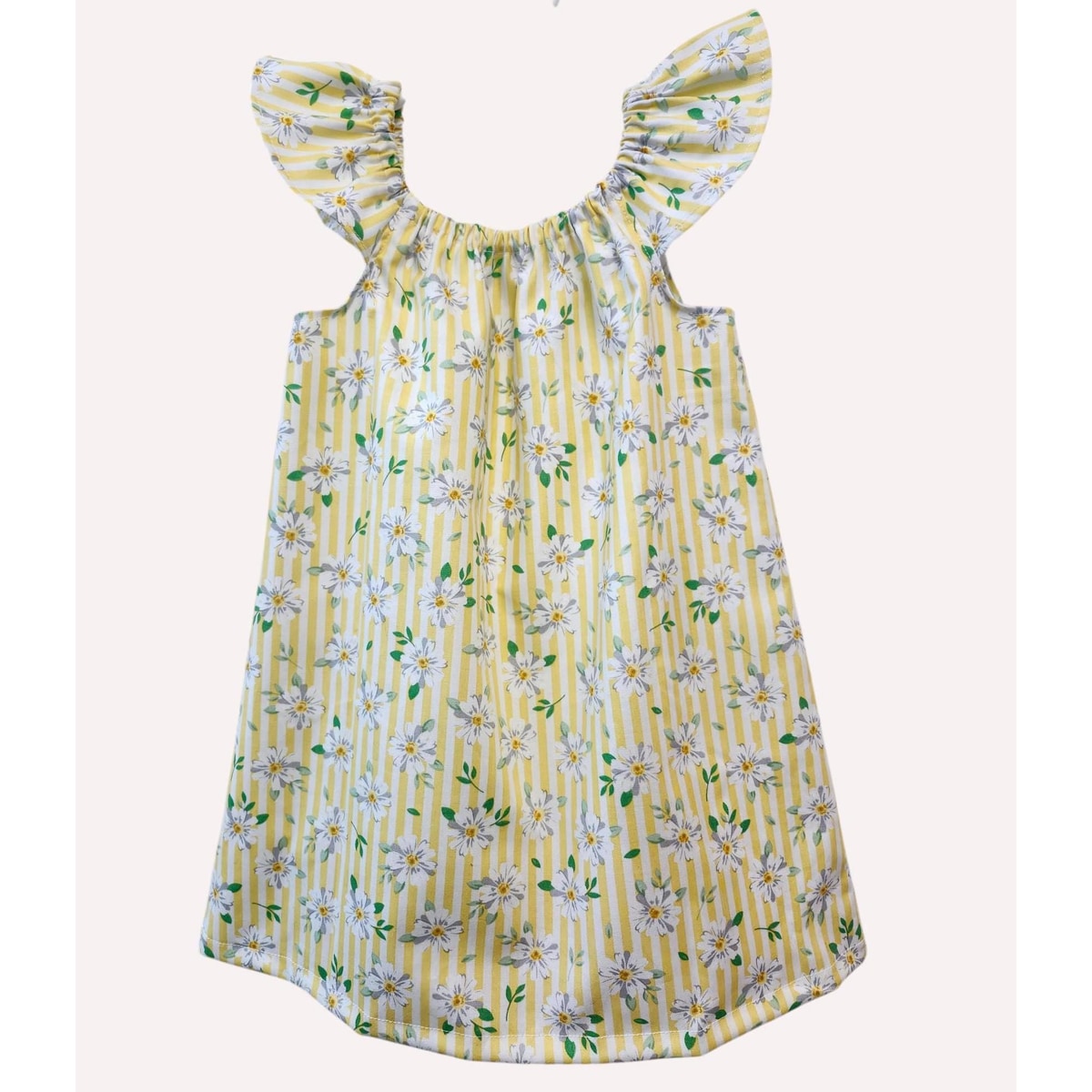 Yellow dress with floral pattern on a white background
