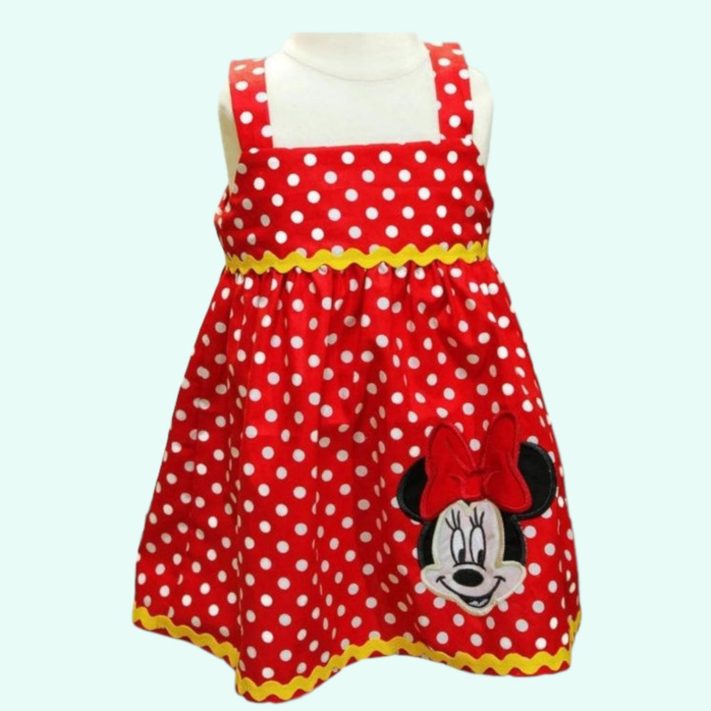 Red polka dot dress with Minnie Mouse design on a white background
