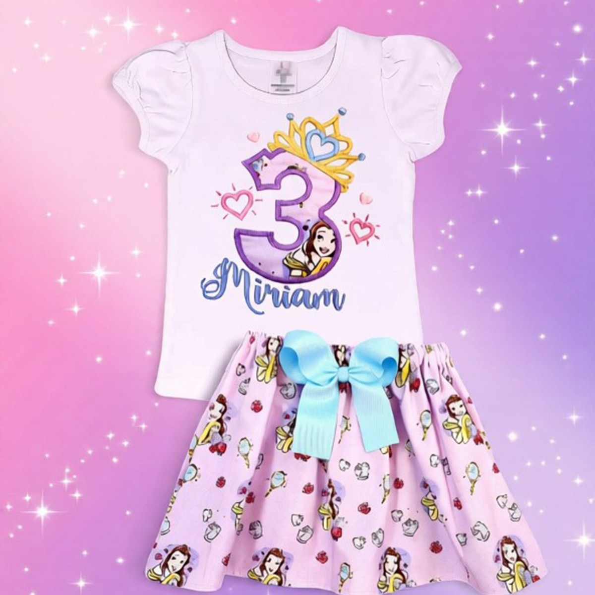 Children's outfit with a white top and patterned skirt on a gradient background